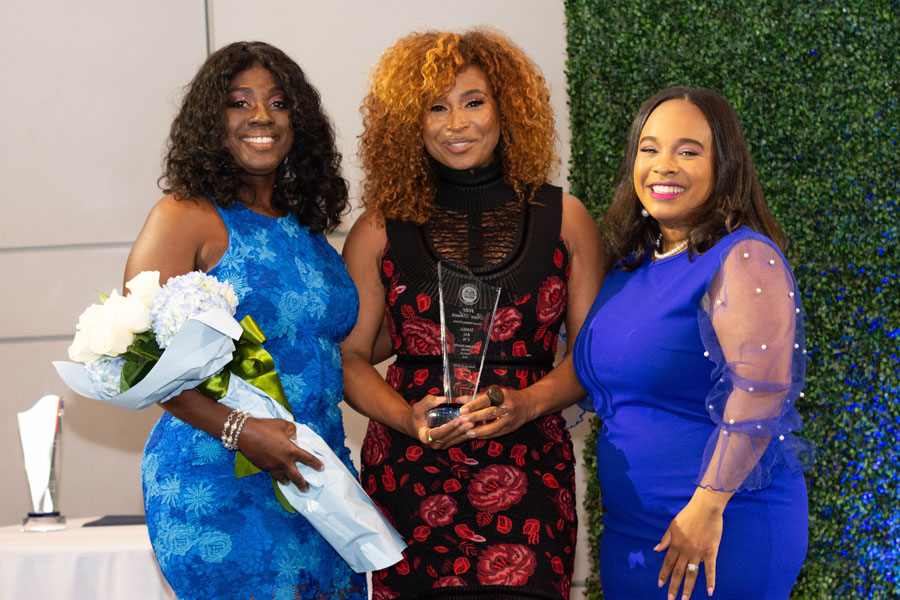 Three NAASC Los Angeles sisters celebrating at the Sisters Awards Brunch